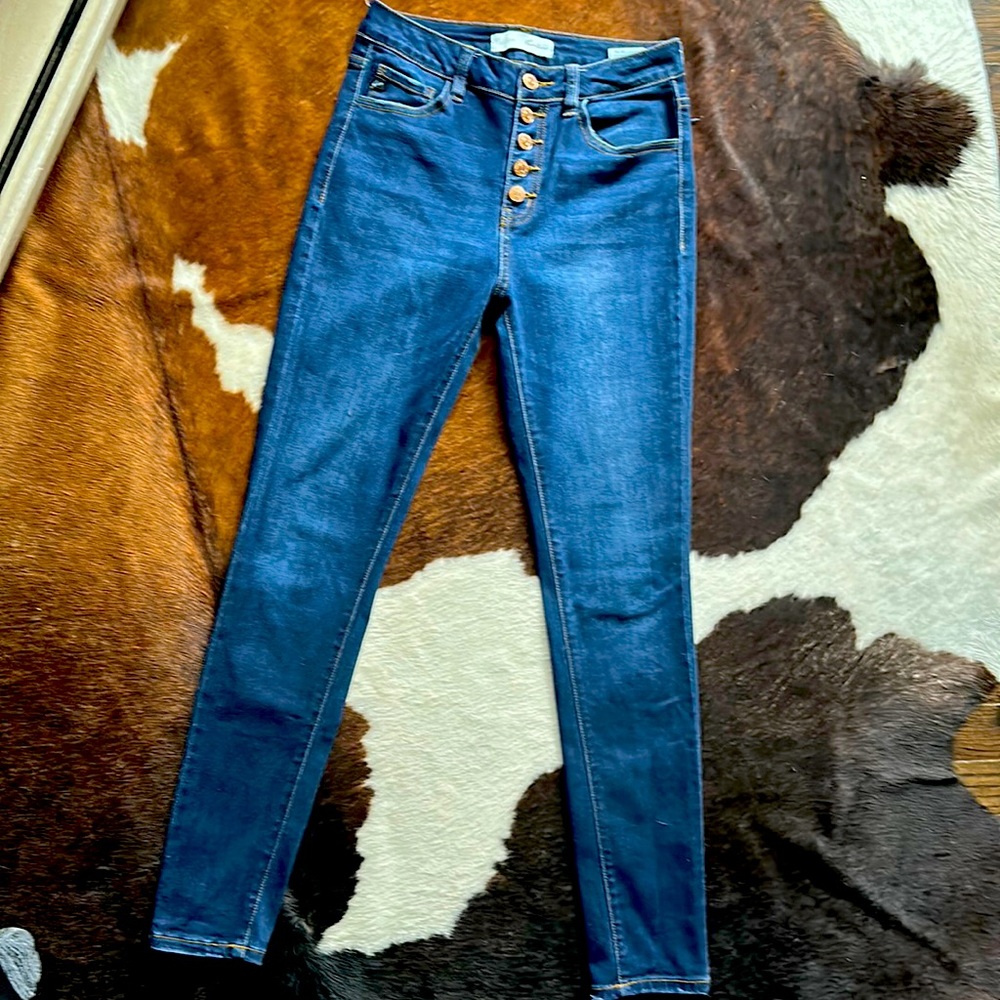 KanCan Curvy button fly dark wash skinny jeans.